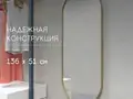 Дизайнерское овальное настенное зеркало Glass Memory Harmony в металлической раме золотого цвета